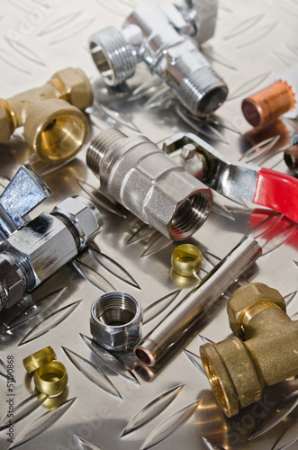 Plumbing Kit on a metal surface