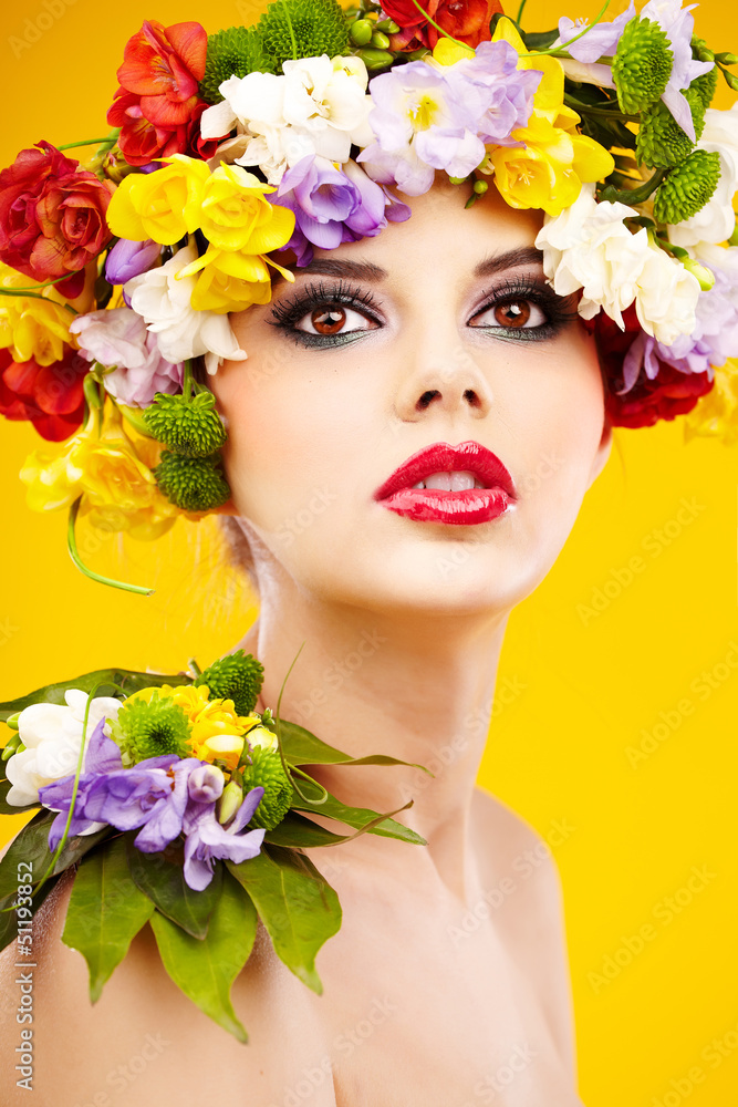 The attractive girl, front portrait, on a head a flower wreath The attractive girl, front portrait, on a head a flower wreath