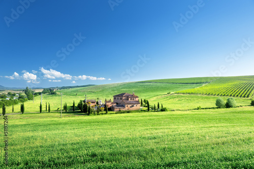 Tuscany landscape with typical farm house, Italty