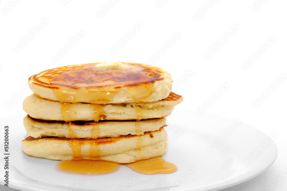 Stack of breakfast pancakes on plate with syrup Stack of breakfast pancakes on plate with syrup