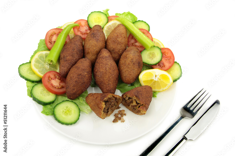 Turkish dish, stuffed meatballs with bulgur - ( icli kofte ) Turkish dish, stuffed meatballs with bulgur - ( icli kofte )