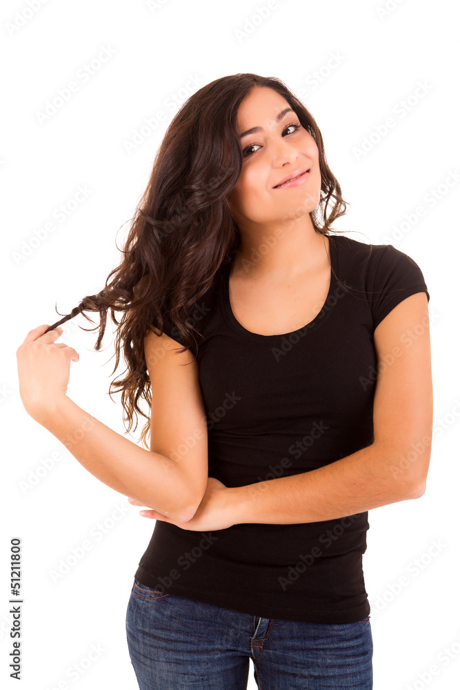 Fototapeta premium Portrait of a pretty young woman standing against white backgrou