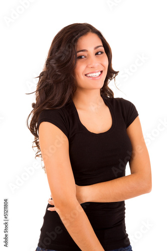 Portrait of a pretty young woman standing against white backgrou © Trendsetter Images