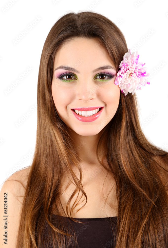 Young beautiful girl with flower in her hair, isolated on white