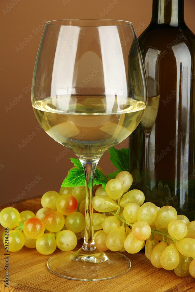 Composition of wine bottle, glass of white wine, grape Composition of wine bottle, glass of white wine, grape
