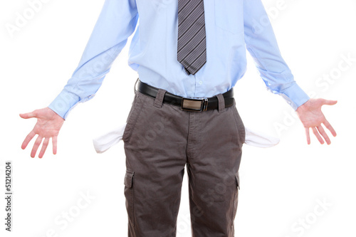 Business man showing his empty pockets, isolated on white