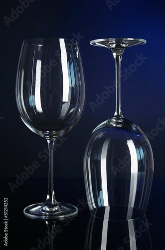 Two glasses on dark blue background