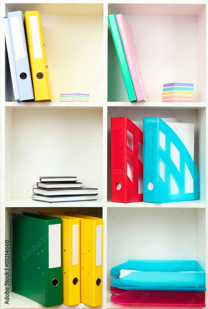 White office shelves with different stationery, close up White office shelves with different stationery, close up