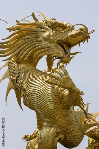Gold dragon statue in chinese temple