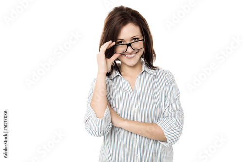 Cute woman adjusting her eyewear