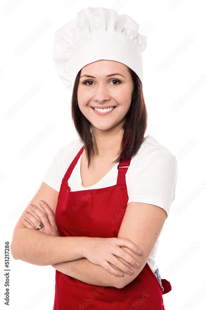 Cheerful confident young female chef Cheerful confident young female chef