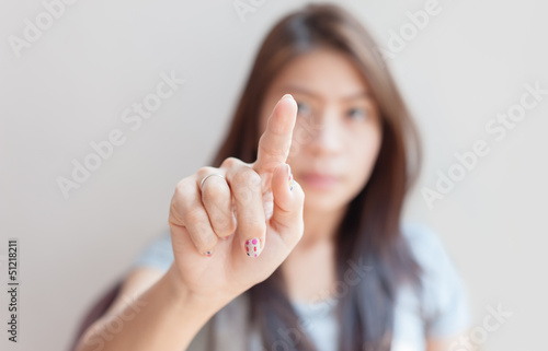 woman pressing an imaginary button empty space