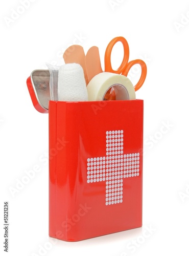 An open travel first aid kit standing on a white background