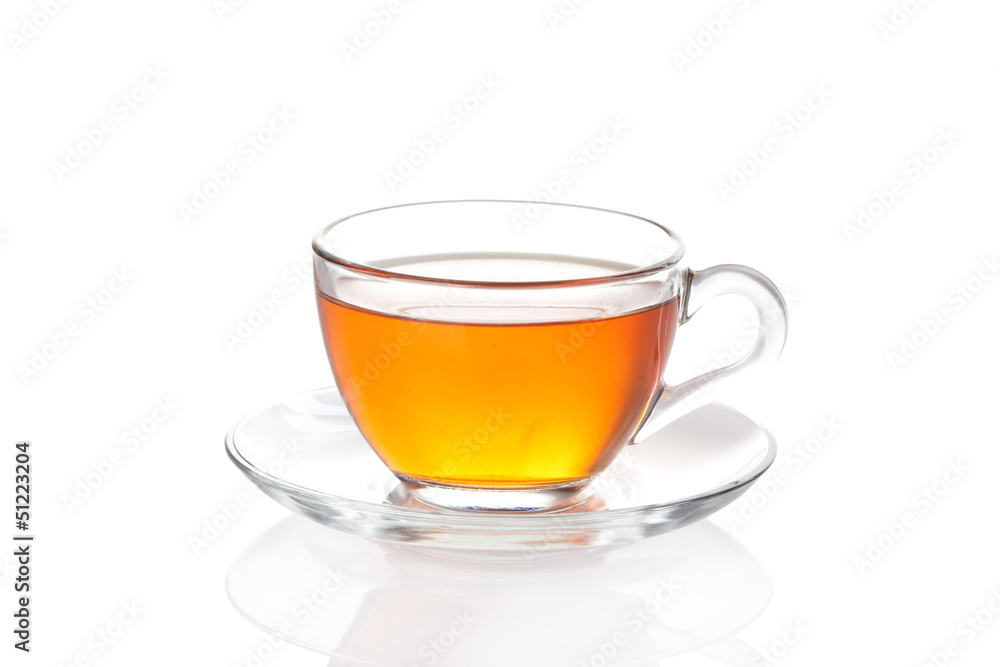 Tea in glass cup isolated on white Tea in glass cup isolated on white
