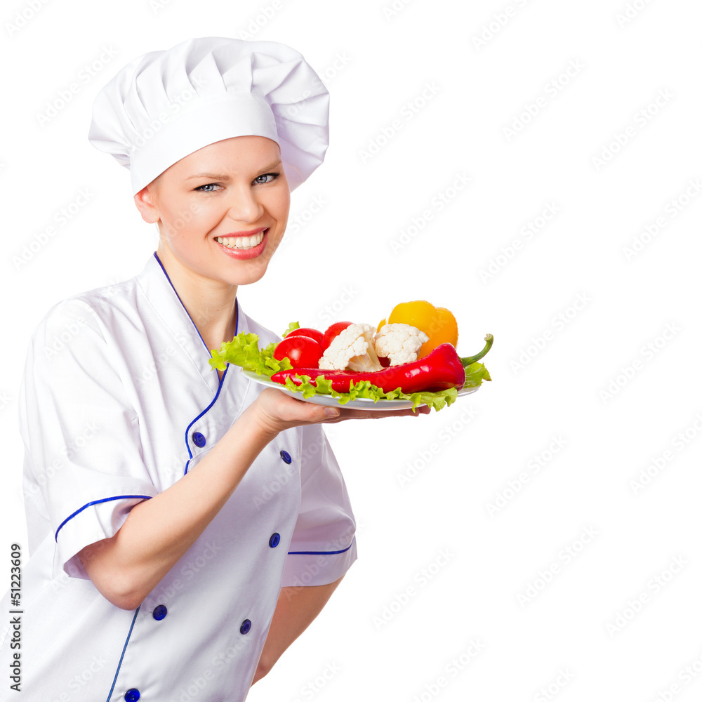 Nice woman cook holding a plate with fresh vegetables Nice woman cook holding a plate with fresh vegetables