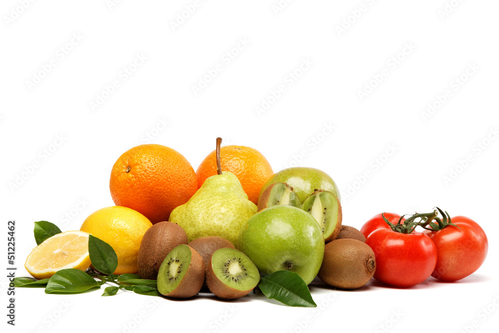 Fresh fruits and vegetables isolated on a white background.