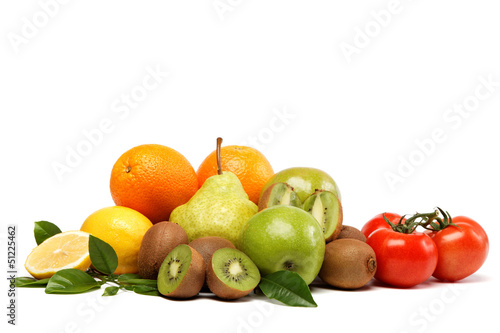 Fresh fruits and vegetables isolated on a white background.