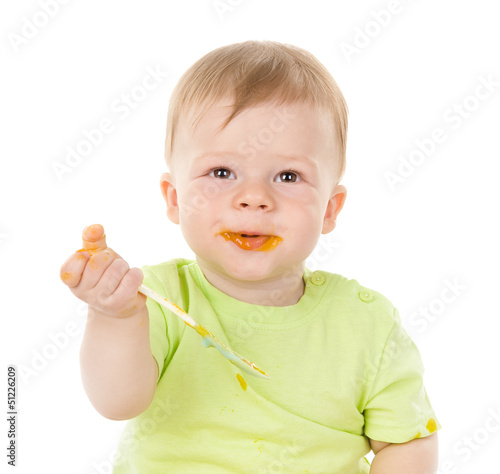 boy with a spoon. isolated on white
