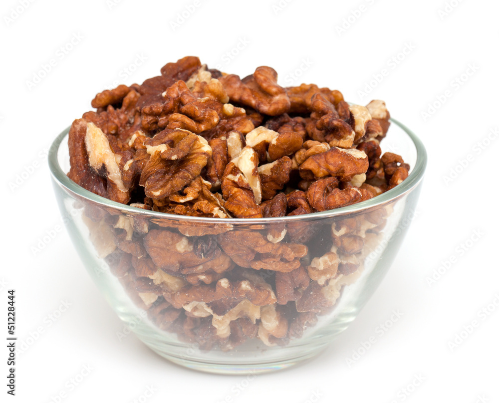 walnuts in a glass bowl walnuts in a glass bowl