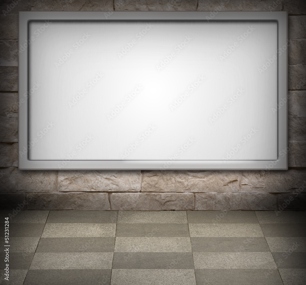 Fototapeta premium Billboard on a stone wall