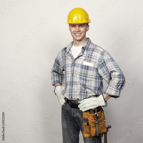 smiling young builder