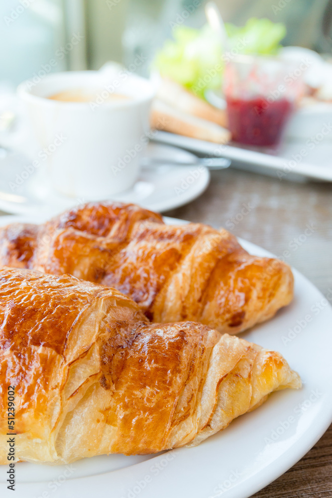 Breakfast with coffee and croissants Breakfast with coffee and croissants