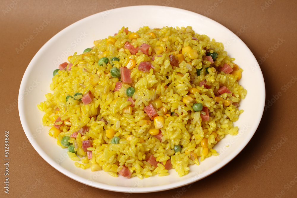 A dish of rice on the table A dish of rice on the table