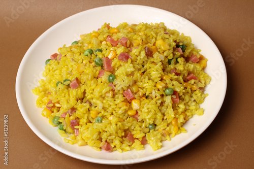 A dish of rice on the table