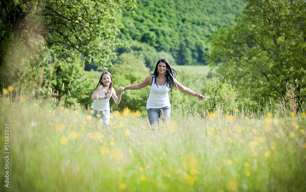 mother and daughter in the park mother and daughter in the park