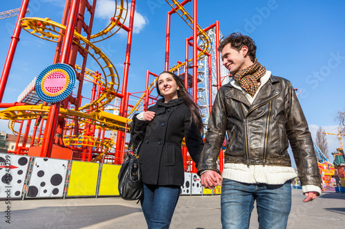 Happy Young Couple at Amusement Park in Wien photo