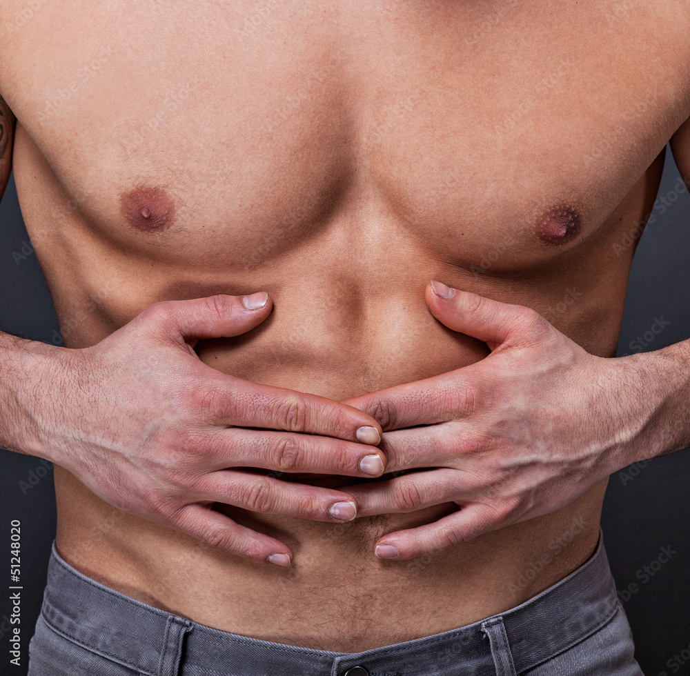 Naklejka premium Trainierter Bauch hat Schmerzen