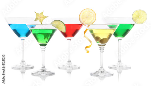 Alcoholic cocktails in martini glasses isolated on white