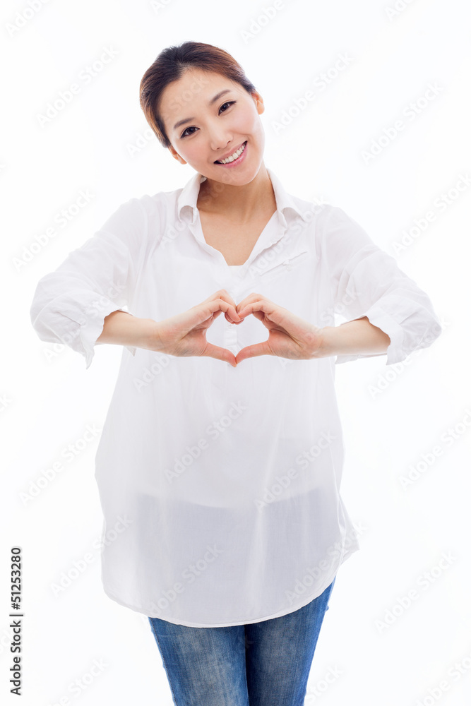 Beautiful Asian casual woman show heart shape. Beautiful Asian casual woman show heart shape.