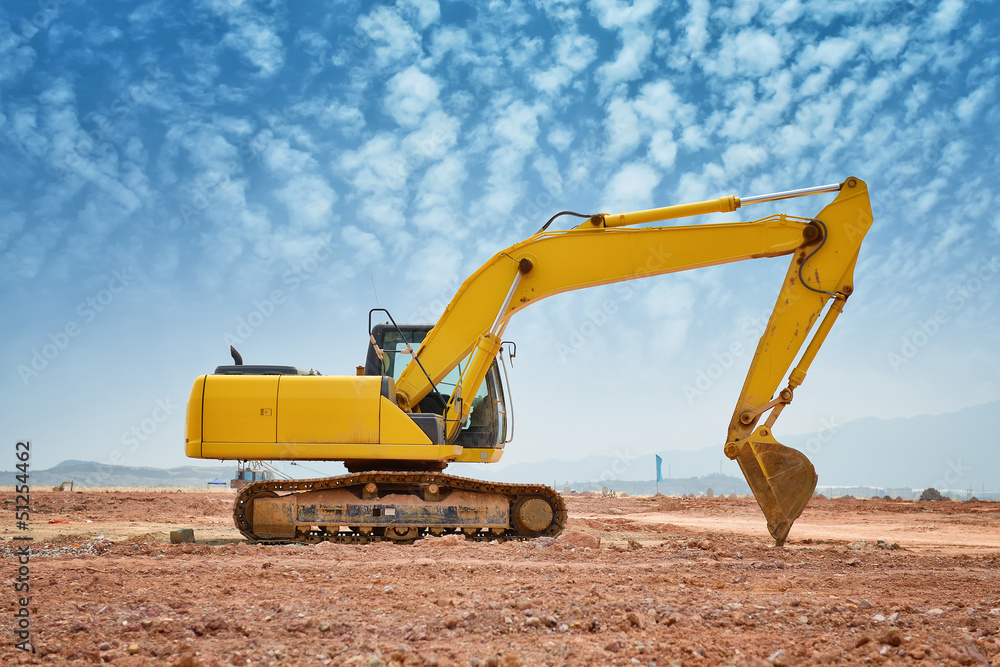 excavator loader machine during earthmoving works outdoors excavator loader machine during earthmoving works outdoors