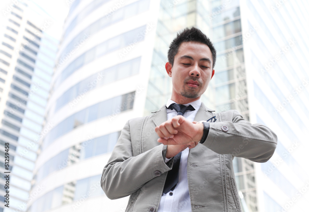 Asian business man in business center Asian business man in business center