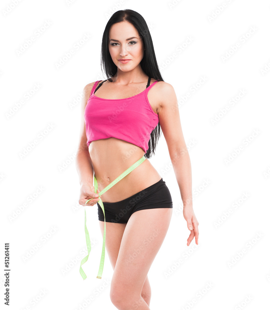 Fototapeta premium Young beautiful woman with measure tape
