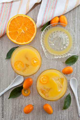 Fresh juice from oranges and kumquats