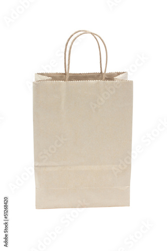 Blank brown paper shopping bag isolated on white background.