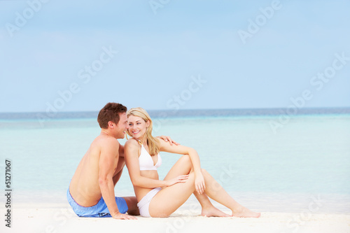 Couple Relaxing On Beautiful Beach Together