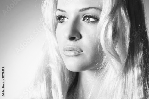 beautiful serious blond adult woman