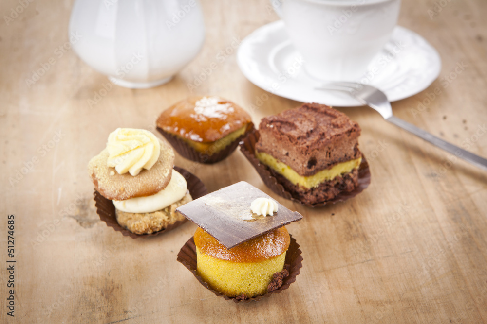 delicious cupcake pastry on wooden background table delicious cupcake pastry on wooden background table