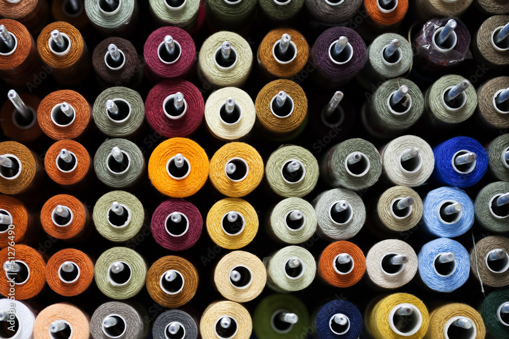 Fototapeta premium Reels with colorful threads