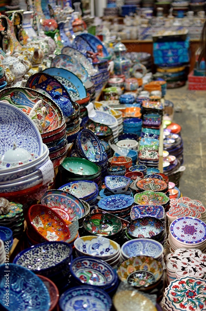 Finely decorated ceramic bowl stacked for sale at market