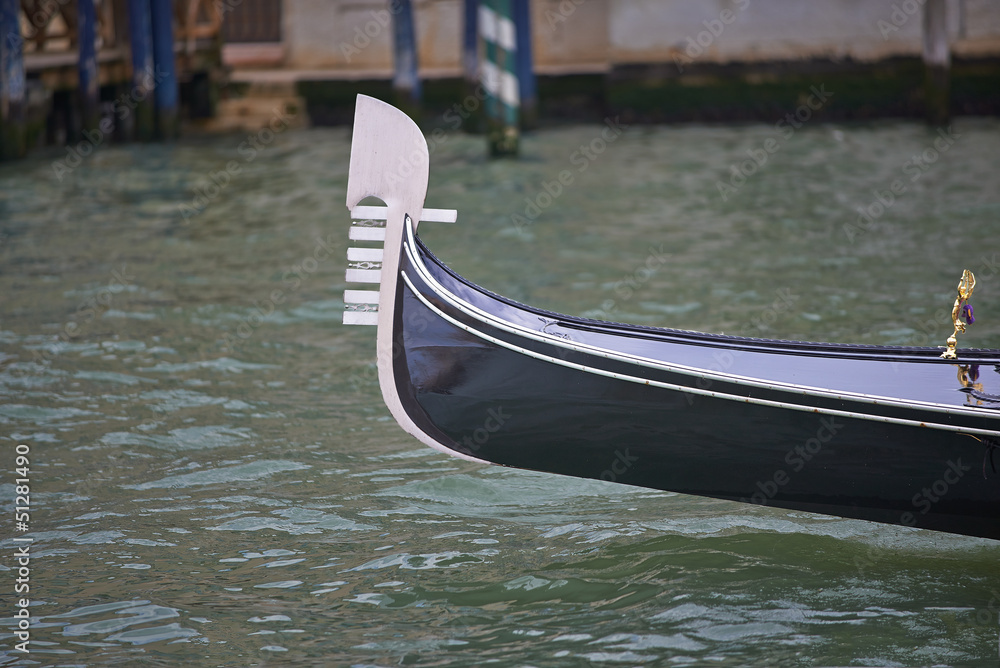 Nose of gondola in Venice canal