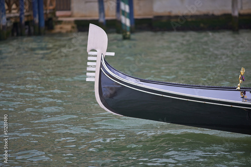 Nose of gondola in Venice canal © dejangasparin