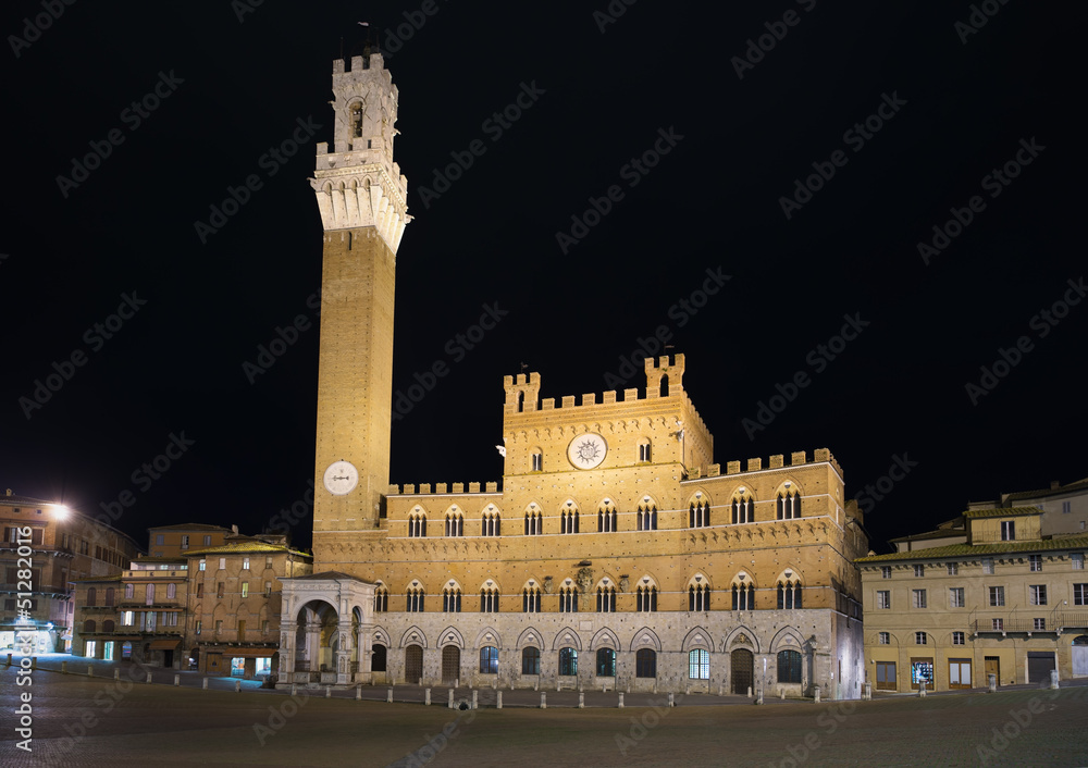 Siena night photo. Piazza del Campo and Mangia tower. Italy