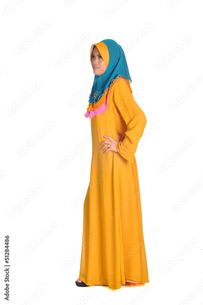 Muslim woman in modern clothes, isolated on white Muslim woman in modern clothes, isolated on white