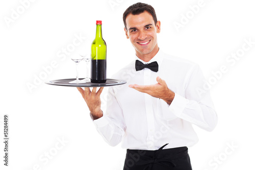 waiter holding tray of wine © michaeljung
