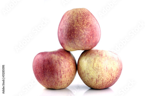 Three Red apple on white background.