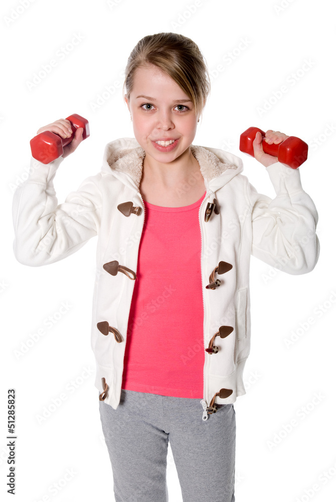 Shot of a sporty girl with dumbbells. Shot of a sporty girl with dumbbells.